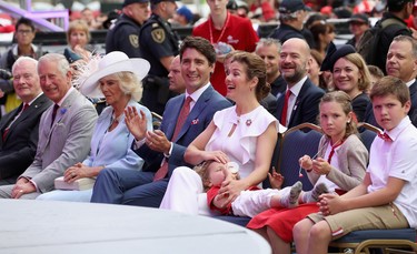 Prince Charles, Prince of Wales, Camilla, Duchess of Cornwall, Sophie Gregoire Trudeau, Justin Trudeau, Hadrien Trudeau, Ella-Grace Trudeau and Xavier Trudeau watch Canada Day Canada Day celebrations on Parliament Hill during a 3 day official visit to Canada on July 1, 2017 in Ottawa. (Chris Jackson/Getty Images)
