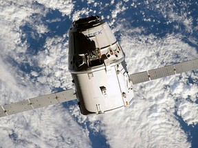 In this Sept. 23, 2014 file photo made available by NASA, the SpaceX Dragon commercial cargo craft approaches the International Space Station.  (NASA via AP,File)