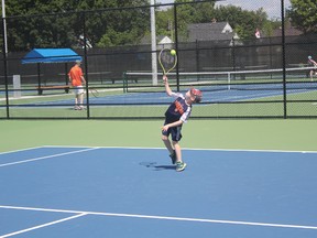 Liam Dlouhy, 6, serves the ball at one of the new tennis courts in Pinafore Park on Monday morning. In addition to eight new tennis courts, the city also built eight new pickleball courts. (Laura Broadley/Times-Journal)