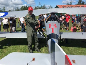 BRUCE BELL/THE INTELLIGENCER 
Former Canadian Air Force pilot Peter Thornton is pictured with one of the Nieuport II replica fighter aircraft a team of 10 pilots are flying from coast to coast as part of the VIMY FLIGHT Birth of a Nation tour.