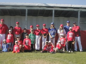 The new challenger baseball team in Whitecourt gathers for a photo during its session on June 30. The team is geared toward giving children with disabilities the chance to play the game for fun (Joseph Quigley | Whitecourt Star)