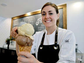 Alana Coughlin, owner of Haven’s Creamery, serves homemade ice cream on a waffle cone at her new downtown shop. (CHRIS MONTANINI\LONDONER\POSTMEDIA NETWORK)