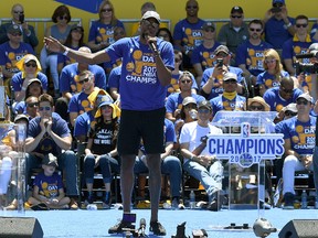Kevin Durant of the Golden State Warriors talks to the fans while they celebrate the Warriors 2017 NBA Championship at The Henry J. Kaiser Convention Center during thier Victory Parade and Rally on June 15, 2017. (Thearon W. Henderson/Getty Images)