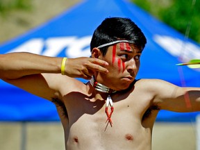 Landon Sasakamoose from the Ahtahkakoop Cree Nation in Saskatchewan takes aim in the Bow & Arrow competition at the 2017 World Indigenous Nations Games. The event was held on the Enoch Cree Nation Reserve west of Edmonton on Monday July 3, 2017. (PHOTO BY LARRY WONG/POSTMEDIA)