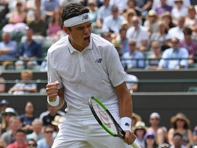 Canada's Milos Raonic reacts after a winning a point against Germany's Jan-Lennard Struff during their men's singles first round match on the second day of the 2017 Wimbledon Championships at The All England Lawn Tennis Club in Wimbledon, southwest London, on July 4, 2017.(JUSTIN TALLIS/AFP/Getty Images)