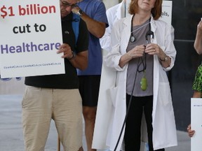 Members of Concerned Ontario Doctors are pictured at a rally last year. (JACK BOLAND, Toronto Sun)