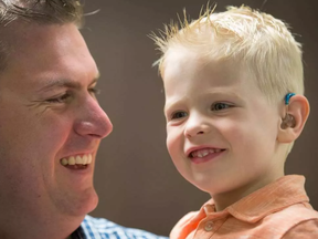 Parker McKay, 3, seen here with his dad Ryan McKay. WAYNE CUDDINGTON / POSTMEDIA