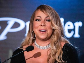 Singer Mariah Carey speaks at a press conference to announce an agreement with Israeli cosmetics brand Premier Dead Sea, in the coastal city of Tel Aviv on June 26, 2017. (JACK GUEZ/AFP/Getty Images)