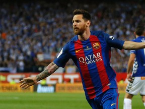 In this Saturday May 27, 2017 file photo, Barcelona's Lionel Messi celebrates after scoring a goal during the Copa del Rey final soccer match between Barcelona and Alaves at the Vicente Calderon stadium in Madrid, Spain. (AP Photo/Daniel Ochoa de Olza, File)
