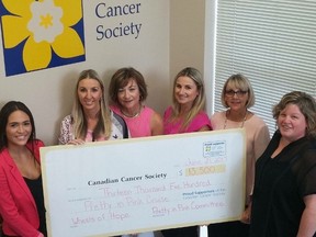 The Canadian Cancer Society receives a cheque worth $13,500 from organizers of the annual Pretty in Pink Cruise. The money will go towards local cancer patients undergoing treatment outside of Lambton County.
Handout/Sarnia This Week