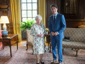 Prime Minister Justin Trudeau meets Queen Elizabeth at Holyrood Palace her official residence in Edinburgh on Wednesday, July 5, 2017. (THE CANADIAN PRESS/Ryan Remiorz)