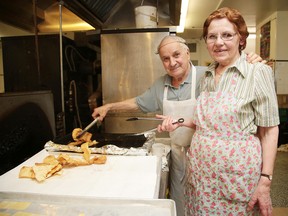 Caruso Club members Vittorio Guizzo and Maria Nizzero cooks some crostoli in preparation for the 45th annual Italian Festival in Sudbury, Ont. on Wednesday July 5, 2017. The 45th annual Italian Festival kicks off with live pro wrestling on Thursday at 6:30, the opening ceremonies take place on Friday at 4:30 followed by the regions of Italy food fair, the festival runs all day Saturday and Sunday.For more information go to www.carusoclub.ca Gino Donato/Sudbury Star/Postmedia Network