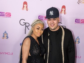 Rob Kardashian and Blac Chyna arrive at her Blac Chyna Birthday Celebration And Unveiling Of Her 'Chymoji' Emoji Collection at the Hard Rock Cafe on May 10, 2016 in Hollywood, California. (Photo by Greg Doherty/Getty Images)