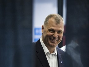 Randy Ambrosie waits behind curtains to be introduced to the media for a press conference announcing he's been hired as the new CFL Commissioner in Toronto on July 5, 2017. 9Craig Robertson/Toronto Sun/Postmedia Network)