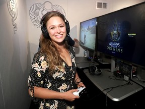 Ronda Rousey plays Assassin's Creed Origins during E3 2017 at Los Angeles Convention Center on June 14, 2017 in Los Angeles. (Neilson Barnard/Getty Images for Ubisoft)