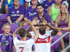 TFC's Jozy Altidore celebrates after scoring during Wednesday night's game against Orlando City. (AP)