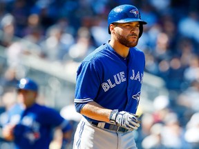 Russell Martin of the Toronto Blue Jays draws an eighth-inning bases-loaded walk against the New York Yankees, scoring teammate Miguel Montero on July 5, 2017. (JIM McISAAC/Getty Images)