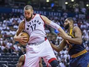 Raptors' Jonas Valanciunas battles with Cavaliers' Tristan Thompson during the NBA playoffs at the Air Canada Centre in Toronto on May 5, 2017. (Ernest Doroszuk/Toronto Sun)