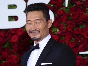 In this June 12, 2016, file photo, Daniel Dae Kim arrives at the Tony Awards at the Beacon Theatre in New York. Kim said in a Facebook post Wednesday, July 5, 2017, his decision to leave "Hawaii Five-O" stemmed from a contract dispute. (Photo by Charles Sykes/Invision/AP, File)