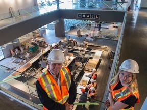 David Terry, GM and Vice President of the Rec Room  with Sarah Van Lange, the director of communications for Cineplex at the new Rec Room location in West Edmonton Mall on July 5, 2017. (Shaughn Butts/Edmonton Sun)