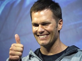 New England Patriots quarterback Tom Brady gestures during a promotional event on June 22, 2017, in Tokyo. (AP Photo/Eugene Hoshiko)
