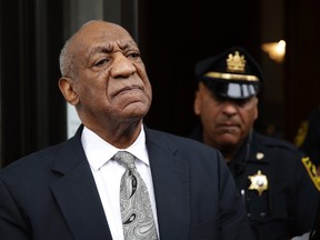 In this Saturday, June 17, 2017, file photo, Bill Cosby exits the Montgomery County Courthouse after a mistrial was declared in his sexual assault trial in Norristown, Pa. (AP Photo/Matt Rourke)