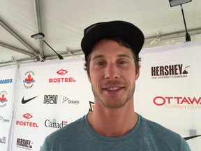 Toronto's Derek Drouin in the media area of the Canadian Track and Field Championships at Ottawa on July 6, 2016. (Gord Holder/Postmedia)