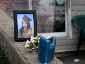 A memorial for Jordin Amber Aksidan, 21, grows outside of the Alexander Plaza apartment near 119A Avenue and 34 Street where Aksidan was found shot on Wednesday, July 5, 2017 in Edmonton, Alta. Aksidan later succumbed to her injuries in hospital. CLAIRE THEOBALD/POSTMEDIA