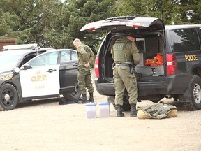 Specialized police officers surrounded a house and implemented a containment operation to a wanted suspect on North Line, just outside of Seaforth. This is a previous photo taken at the first altercation last November, on July 5, similar to before, several officers were on hand. (Shaun Gregory/Huron Expositor)