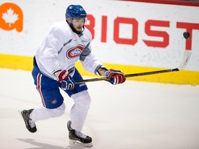 Montreal Canadiens' Alex Galchenyuk goes after a flying puck during a practice Monday, April 10, 2017 in Brossard, Que. (The Canadian Press)