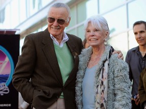 In this Jan. 4, 2011, file photo, comic book creator Stan Lee, left, poses with his wife Joan after he received a star on the Hollywood Walk of Fame in Los Angeles. (AP Photo/Chris Pizzello, File)