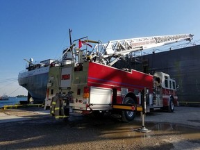 Sarnia and Point Edward firefighters battled a galley fire in the ship Ojibway, at Sarnia Harbour Thursday evening. It caused an estimated $100,000 damage and a city firefighter was taken to hospital with injuries. (Photo via Point Edward Fire and Rescue Facebook)