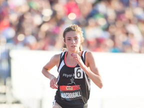 Kingston’s Brogan MacDougall, 16, of Physi-Kult track and field club, runs to victory in the under-20 women’s 3,000 metres at the Canadian Track and Field Championships in Ottawa Thursday night. MacDougall won the event in 9:21.84, shattering her personal-best time of 9:29.65. (Sean W. Burges/Mundo Sport Images)