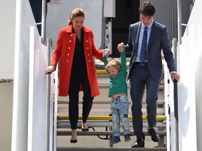 Canadian Prime Minister Justin Trudeau (R), his wife Sophie Gregoire and his son Hadrian arrive at the airport in Hamburg, northern Germany on July 6, 2017 to attend the G20 meeting. (Christof Stache/AFP/Getty Images)