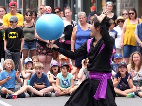 Ace-K, from Japan, performs on Princess Street during the second day of the Kingston Buskers Rendezvous on Friday. The four-day event wraps up Sunday at 6 p.m. with the Grand Finale at Confederation Park. (Ian MacAlpine/The Whig-Standard)
