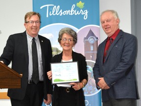 Henriette Benoit is presented the Town of Tillsonburg's Volunteer of the Month Award for May by Mayor Stephen Molnar and Councillor Brian Stephenson. (Contributed Photo)