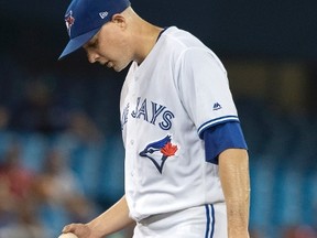 Toronto Blue Jays starting pitcher Aaron Sanchez waits on the mound for his manager after giving up six runs to the Houston Astros in the second inning of an MLB game on July 7, 2017. (THE CANADIAN PRESS/Fred Thornhill)