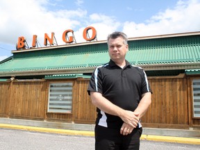 Richard Schwar, charity co-ordinator for Sudbury Bingo Charities, stands in front of the Boardwalk Gaming Centre on Newgate Avenue. Schwar says charities that rely on bingo revenue are concerned they could lose their gaming revenue. (BEN LEESON/THE SUDBURY STAR)