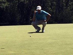 Kramer Hickok lines up a putt on the ninth hole during the second round of the Players Cup at Pine Ridge Golf Club. Kramer is two strokes off the lead after 36 holes. (Ken Wiebe/Winnipeg Sun)