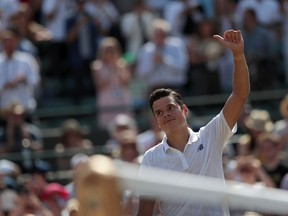Canada's Milos Raonic reacts after winning against Spain's Albert Ramos-Vinolas during their men's singles third round match on the sixth day of the 2017 Wimbledon Championships at The All England Lawn Tennis Club in Wimbledon, southwest London, on July 8, 2017. (Daniel Leal-Olivas/AFP/Getty Images)