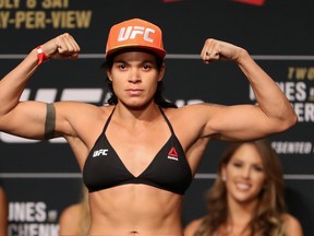 Amanda Nunes of Brazil poses on the scale during the UFC weigh-in at the Park Theater on July 7, 2017 in Las Vegas, Nevada. (Christian Petersen/Getty Images)
