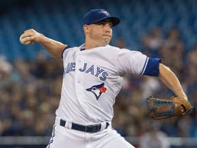 Toronto Blue Jays starting pitcher Aaron Sanchez throws against the Houston Astros during the first inning of their American League MLB baseball game in Toronto on Friday, July 7, 2017. (Fred Thornhill/THE CANADIAN PRESS)
