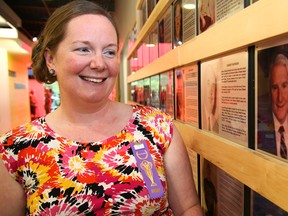 Jamie Seniuk looks at the plaque of her father, the late Don McFadden, on the Quinte West Sports Wall of Fame at the YMCA on  Saturday July 8, 2017 in Quinte West, Ont. Senuik was inducted into the athlete category of the sports wall of fame this year. Her father was inducted as a builder in 2012. Tim Miller/Belleville Intelligencer/Postmedia Network