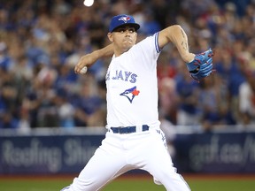 TORONTO, ON - JULY 6: Roberto Osuna #54 of the Toronto Blue Jays delivers a pitch in the ninth inning during MLB game action against the Houston Astros at Rogers Centre on July 6, 2017 in Toronto, Canada. (Tom Szczerbowski/Getty Images)