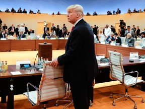 U.S. President Donald Trump arrives for another working session during the G20 summit in Hamburg, northern Germany, on July 8, 2017. Leaders of the world's top economies gather from July 7 to 8, 2017 in Germany for likely the stormiest G20 summit in years, with disagreements ranging from wars to climate change and global trade. (MARKUS SCHREIBER/AFP/Getty Images)