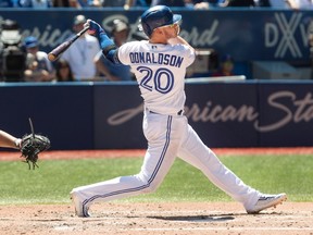 Toronto Blue Jays' Josh Donaldson hits a three-run home run against the Houston Astros in the fifth inning of their American League MLB baseball game in Toronto on Saturday July 8, 2017. (THE CANADIAN PRESS/Fred Thornhill)