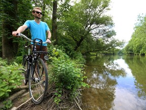 Daniel Hall the director of London Cycle Link is eager for the city to build two bridges across the north branch of the Thames to connect the paths that end in Ross Park on Richmond, to the paths that extend eastward from the Adelaide Road soccer fields in London. (MIKE HENSEN, The London Free Press)