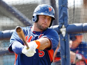 In a Tuesday, Sept. 20, 2016 file photo, Tim Tebow practices his swing during batting practice, in Port St. Lucie, Fla. (AP Photo/Wilfredo Lee, File)