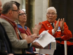 Herb Belcourt (right), an RCMP Ambassador to the Commanding Officer, applauds during marks the anniversary of Mr. Riel’s execution in 1885 by the Métis Nation of Alberta in Edmonton, Alberta on Wednesday, November 16, 2016. Ian Kucerak / Postmedia