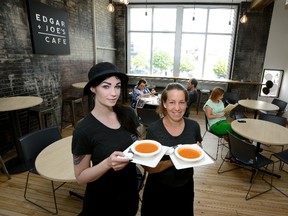 Kat Krawczuk, left, and Angela Deen work as servers at the second location of Edgar and Joe's Cafe in Innovation Works on King Street in London. (MORRIS LAMONT, London Free Press)